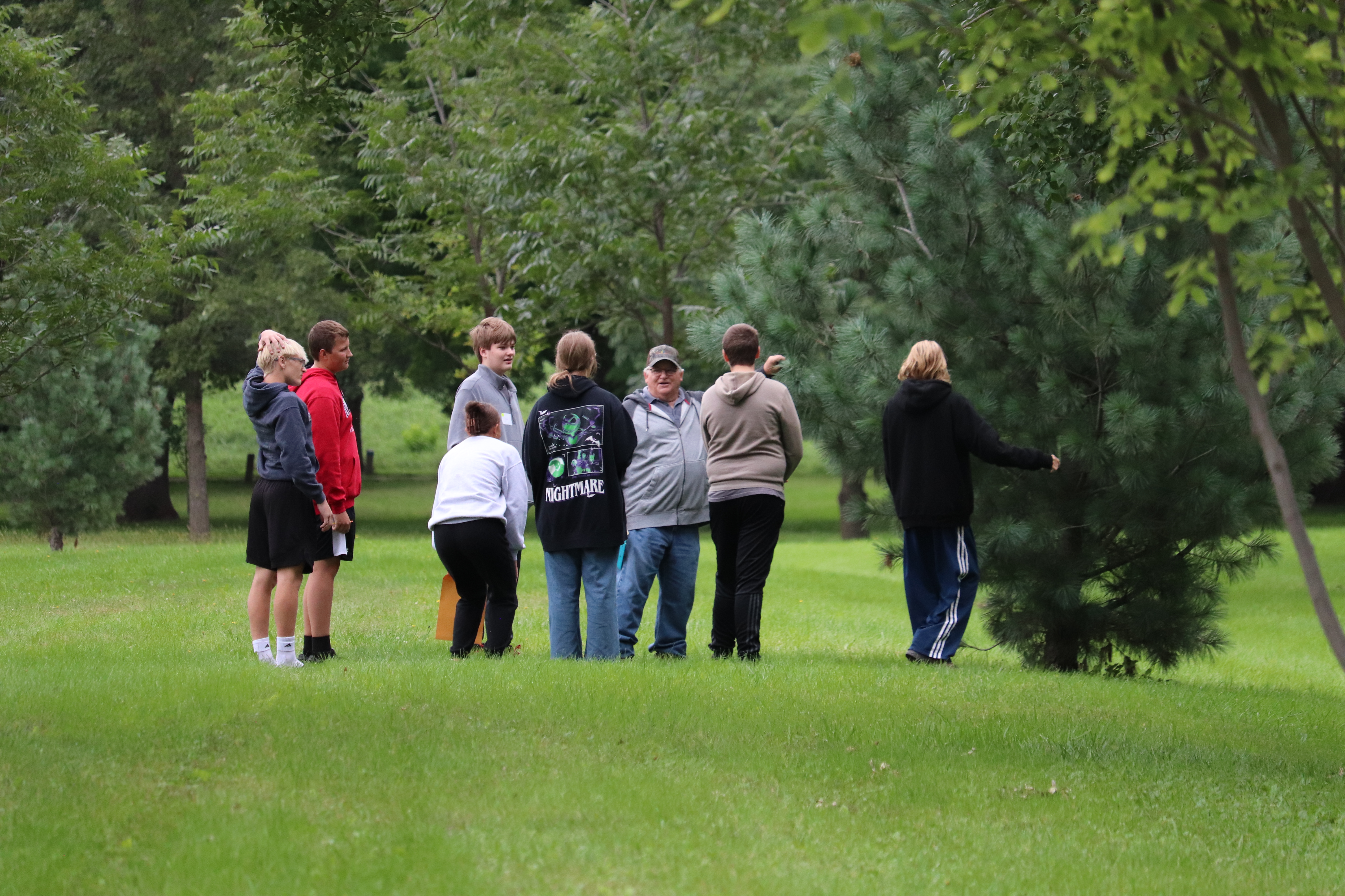 Todd Stewart, LENRD Natural Resources Technician, teaches students about the importance of trees and identifies species with a fun-filled scavenger hunt.