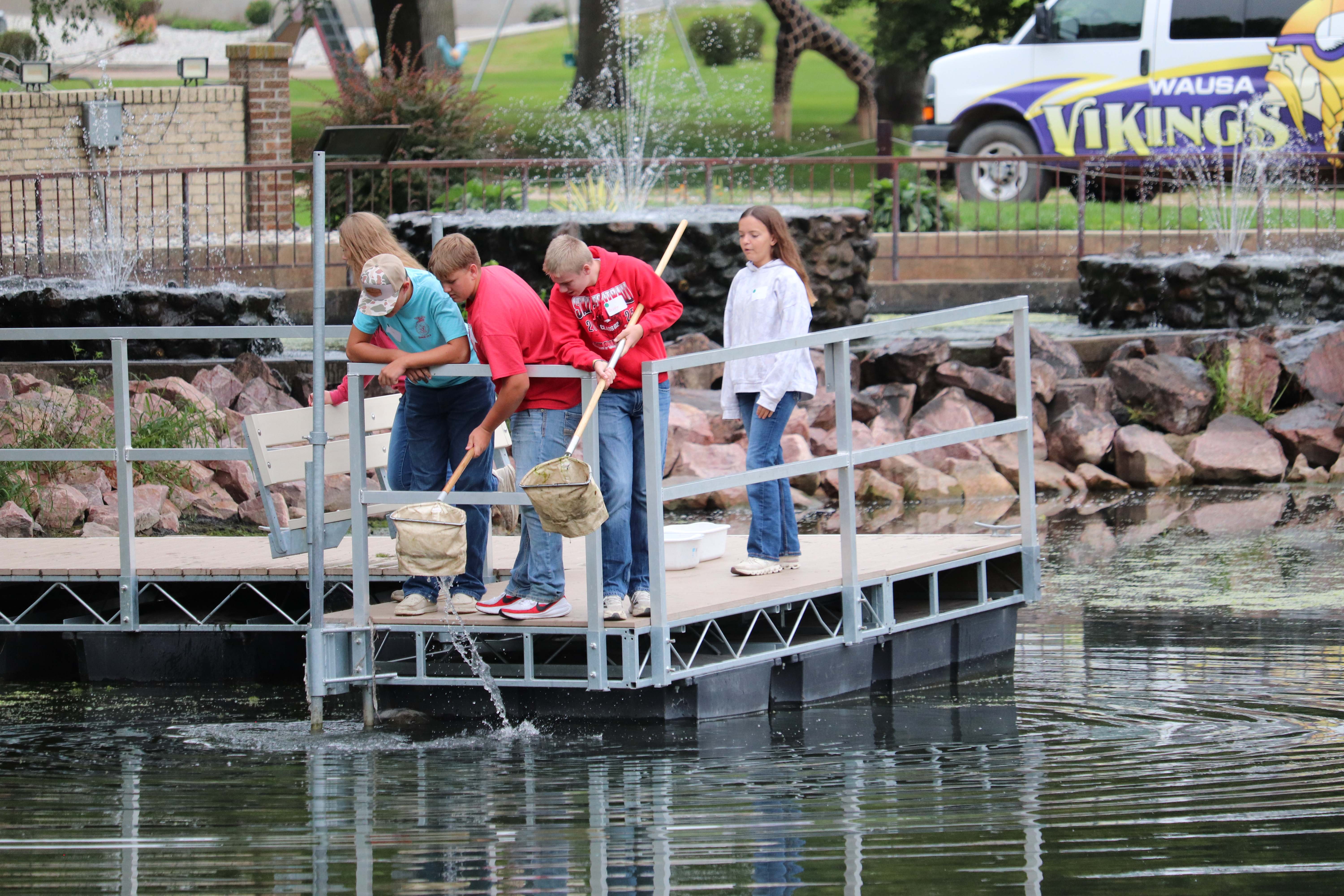 Students collect aquatic insects and learn their roles in our ecosystem with UNL Entomologist Wayne Ohnesorg.